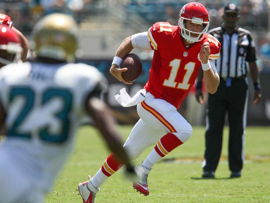 Kansas City Chiefs quarterback Alex Smith (11) runs towards the end zone during the game against the Jacksonville Jaguars at EverBank Field. (Photo: Rob Foldy, USA TODAY Sports)